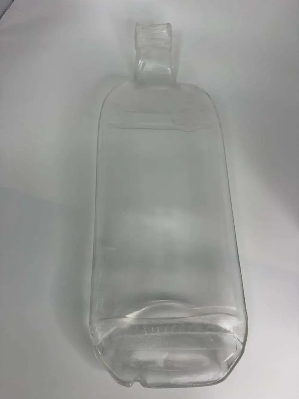 Melted Whiskey Bottle Spoon Rest 12.5”x5”